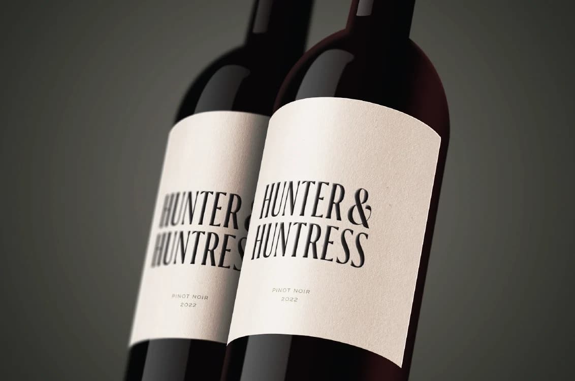 Two Hunter & Huntress Pinot Noir bottles grouped together
